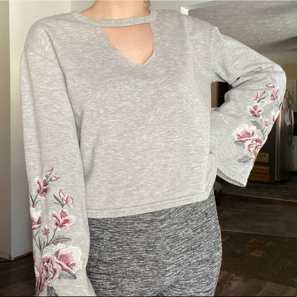 Almost famous embroidered floral sleeves crop top